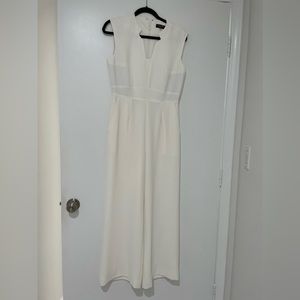 White Tahari jumpsuit with pickets. New, never worn.